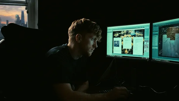 Charlie working at his desk